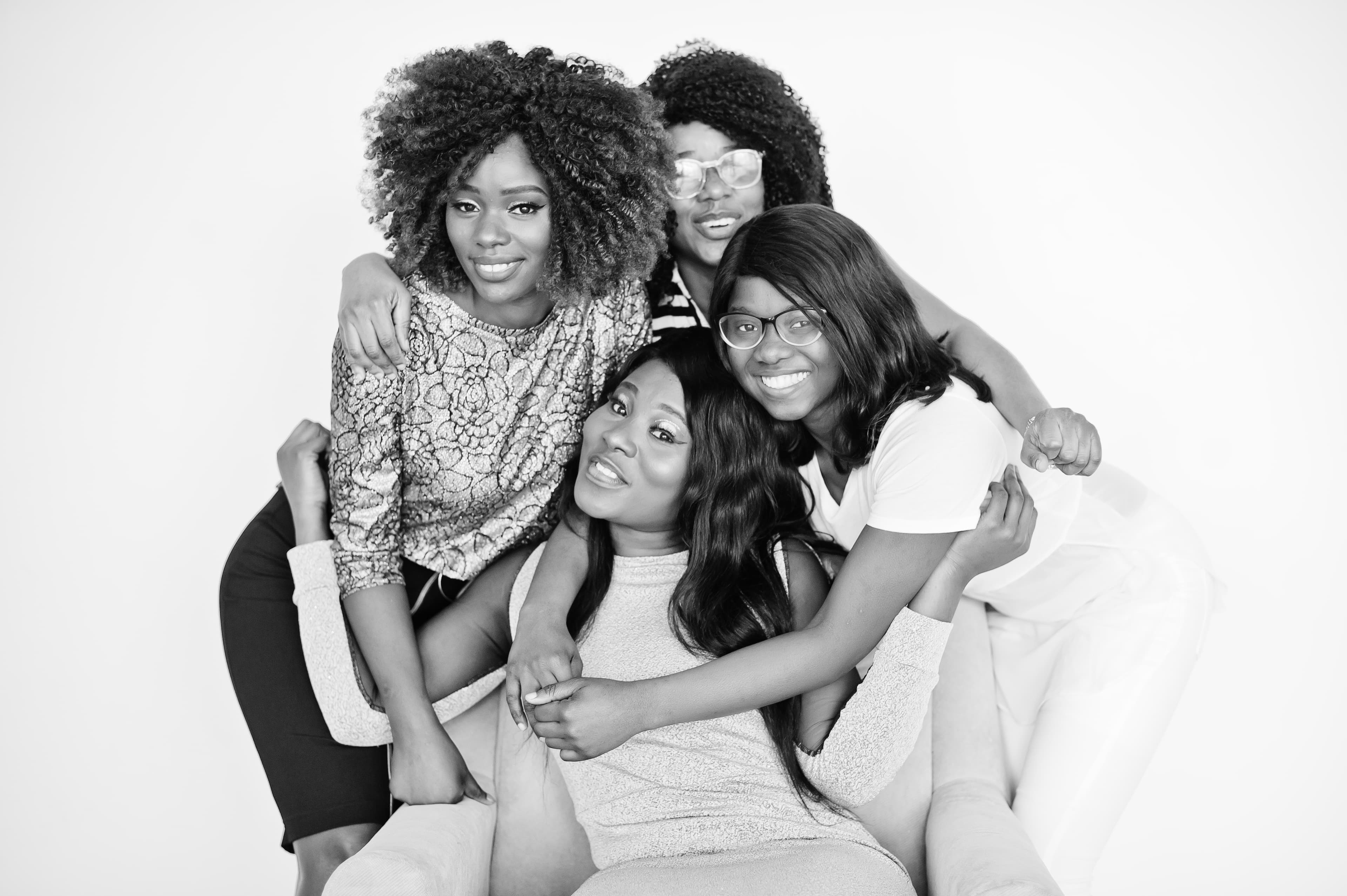 Four friends laughing together โ your Fintribe tribe.